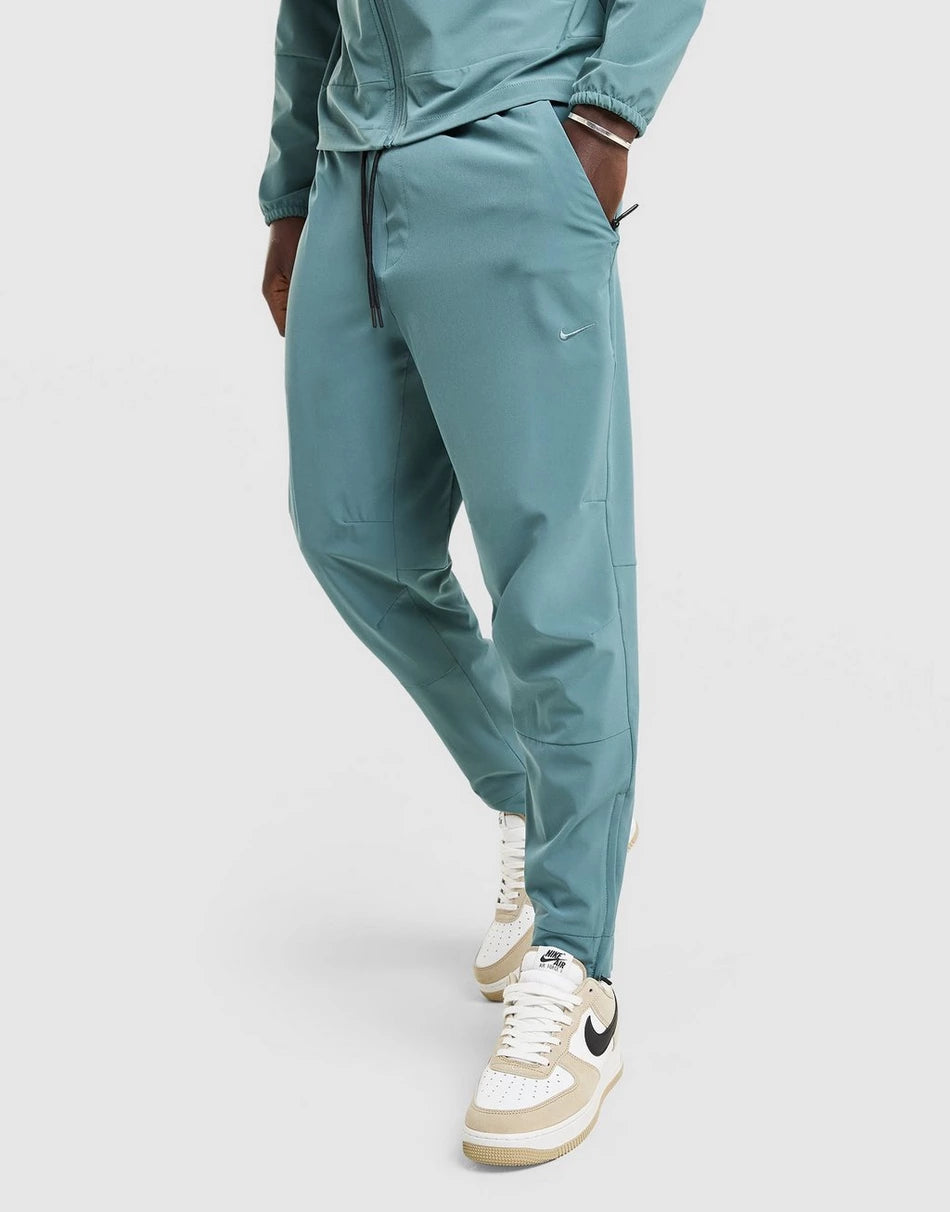 Pantalon de Survêtement Nike Homme – Training Confort Bleu/Vert