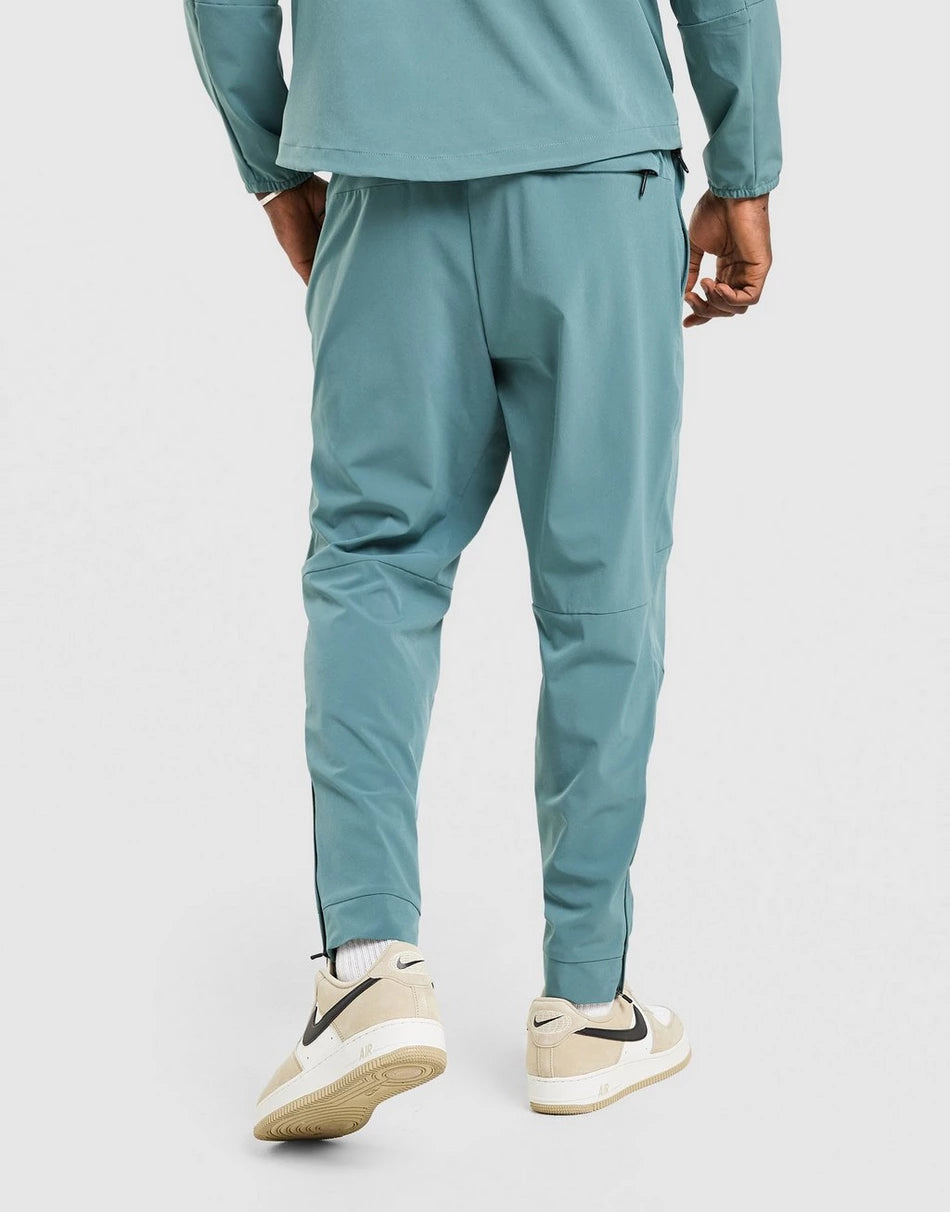 Pantalon de Survêtement Nike Homme – Training Confort Bleu/Vert