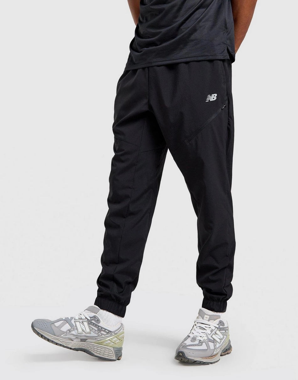 Pantalon New Balance Homme – Sport Woven Noir Léger Confort