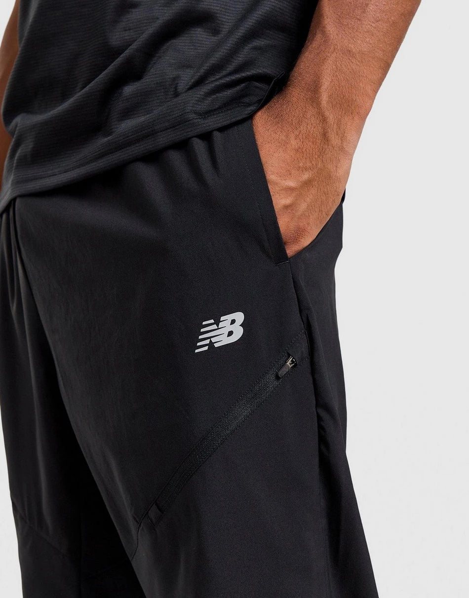 Pantalon New Balance Homme – Sport Woven Noir Léger Confort